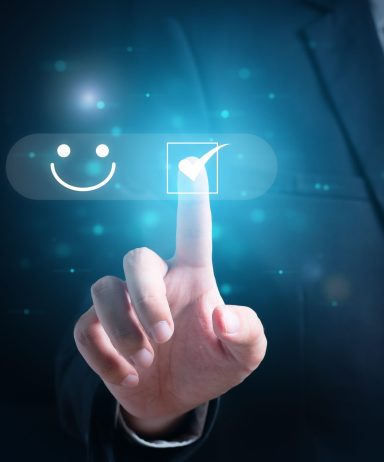 Businessman pressing smiley face emoticon on virtual touch screen, Customer service evaluation, Rating feedback icon and best score point to review service